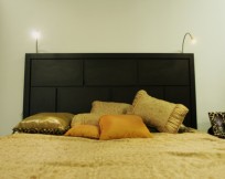 Headboard with adjustable goose-neck lamps